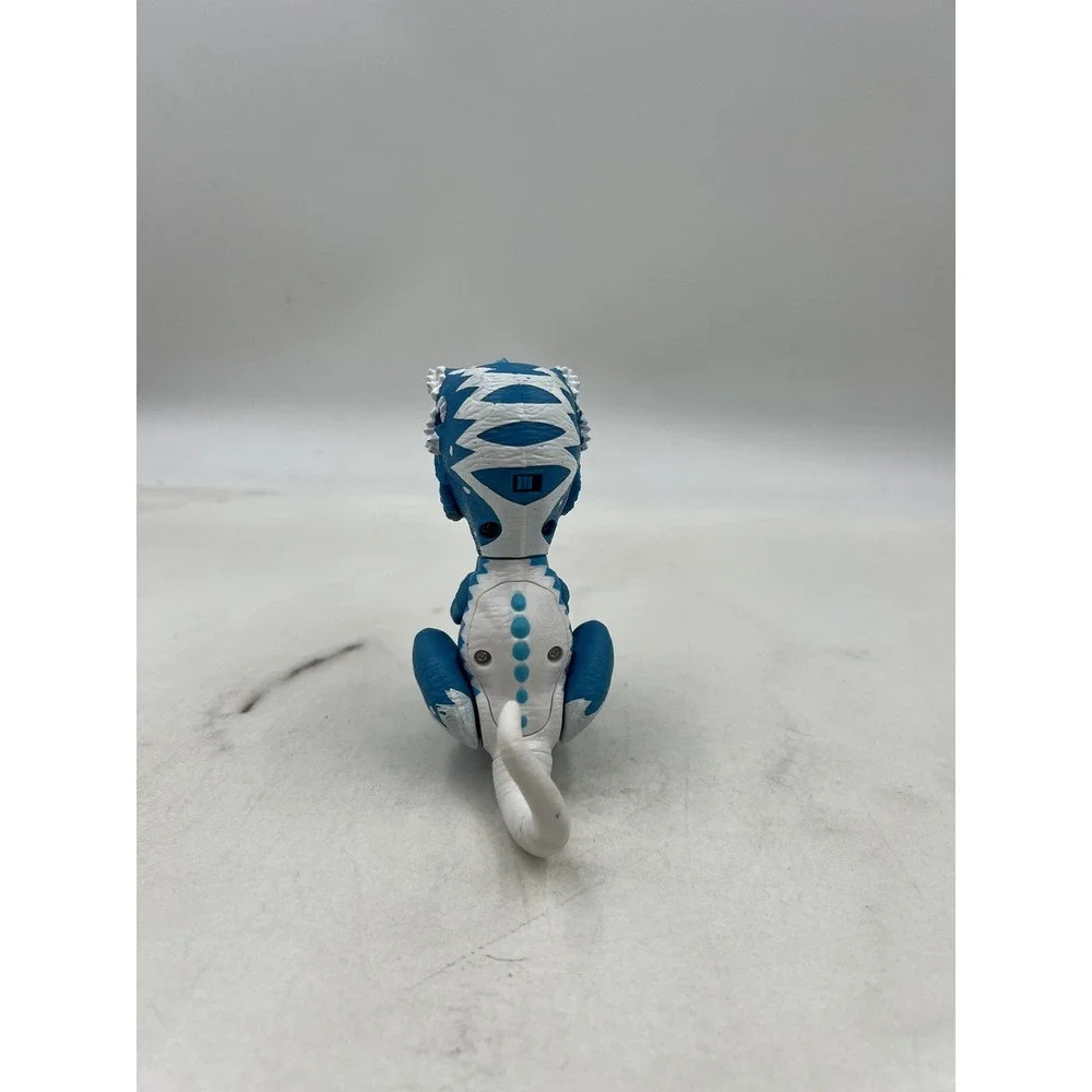 WowWee Fingerlings Untamed T-Rex Ironjaw Blue White Interactive Dinosaur Toy